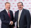 Handshake for a big deal: Edward D. Breen, Chairman and CEO of DuPont, and Andrew N. Liveris, President Chairman and CEO of Dow, agreed to a merger of equals. (Source: Dow) 